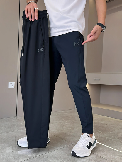 Under Armour - Pantaloni asciutti super elasticizzati unisex